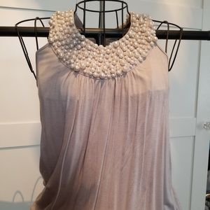 Embellished tank